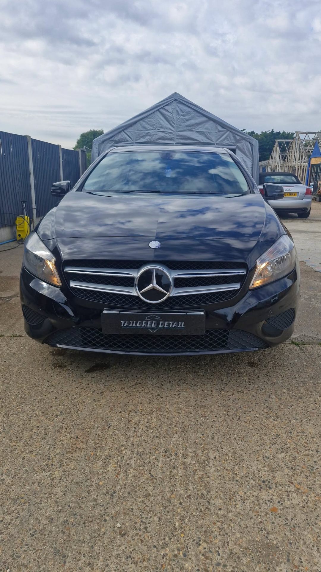 Front view of a black Mercedes A-Class after a full detail at Tailored Detail