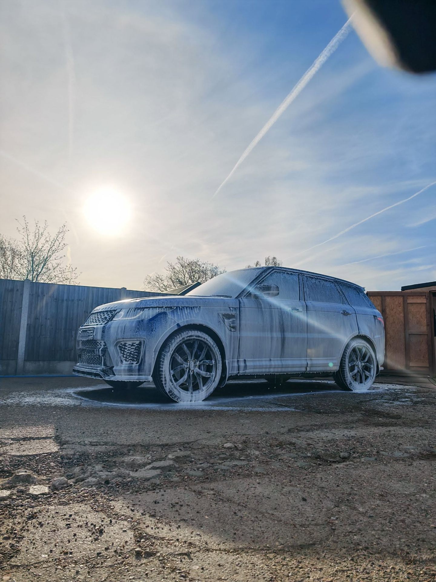 Range Rover Sport during exterior deep clean and snow-foam decontamination